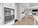 Updated kitchen showcases modern stainless steel appliances, and easy access to living areas at 7201 Talamore Dr, Wesley Chapel, FL 33545
