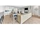 Stylish living space connected to the kitchen area, perfect for entertaining and gatherings at 7201 Talamore Dr, Wesley Chapel, FL 33545
