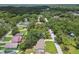 Neighborhood with tree coverage, showcasing home and surroundings at 7308 Avonwood St, Tampa, FL 33625