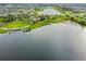 Breathtaking view of lakefront walking paths, playground, and pristine green spaces in the community at 7520 Paradiso Dr, Apollo Beach, FL 33572