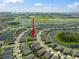 Aerial view of the home's location highlighting surrounding neighborhoods, lakes, and green spaces at 7520 Paradiso Dr, Apollo Beach, FL 33572