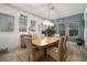 Dining room featuring lots of light with nice table set, and serene decor at 7520 Paradiso Dr, Apollo Beach, FL 33572