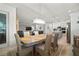 Open concept design showing kitchen, living room and dining room with stylish decor throughout at 7520 Paradiso Dr, Apollo Beach, FL 33572