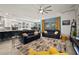 Open concept living area showcasing modern design elements, stylish furniture, and a seamless flow at 7520 Paradiso Dr, Apollo Beach, FL 33572