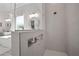 Modern bathroom featuring dual shower heads and sleek tile work for a refreshing experience at 7520 Paradiso Dr, Apollo Beach, FL 33572