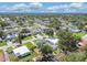 A vibrant neighborhood offers well-kept lawns, mature trees, and charming homes in a suburban setting at 7806 N Matanzas Ave, Tampa, FL 33614