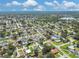 A well-planned community with tree-lined streets and an array of homes in a vibrant suburban area at 7806 N Matanzas Ave, Tampa, FL 33614
