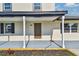 Charming front porch that enhances the curb appeal of this beautiful home at 7806 N Matanzas Ave, Tampa, FL 33614