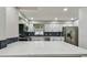 Modern kitchen showcasing white cabinets, stainless steel appliances, and contrasting backsplash at 7806 N Matanzas Ave, Tampa, FL 33614