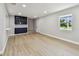 Bright and open living area, enhanced by modern cabinets and recessed lighting at 7806 N Matanzas Ave, Tampa, FL 33614