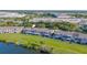 Aerial view of the community, showcasing the building's patios and lake access at 8251 118Th Ave # 8251, Largo, FL 33773