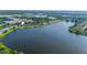 Beautiful aerial view from above the lake with the home location marked with an arrow at 8251 118Th Ave # 8251, Largo, FL 33773