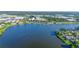 Beautiful lake view from an aerial view with the home location marked with an arrow at 8251 118Th Ave # 8251, Largo, FL 33773