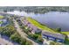 Aerial view of lakeside homes, showcasing well-maintained landscaping and reflective water views at 8251 118Th Ave # 8251, Largo, FL 33773