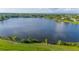 Wide aerial view of the lake from this community with beautiful landscaping at 8251 118Th Ave # 8251, Largo, FL 33773