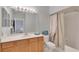 Bathroom featuring a shower/tub combo and single sink vanity at 8251 118Th Ave # 8251, Largo, FL 33773