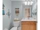 Cozy half-bath with coastal decor and neutral paint color at 8251 118Th Ave # 8251, Largo, FL 33773