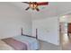Bedroom featuring a comfortable bed, closet, and neutral decor at 8251 118Th Ave # 8251, Largo, FL 33773