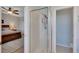 The shower's tile and glass doors complement the bedroom's natural light at 8251 118Th Ave # 8251, Largo, FL 33773