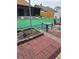 Backyard with a blend of patio and artificial grass at 8718 Lindenhurst Pl, Tampa, FL 33634