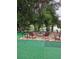 Outdoor seating area with a view of the water at 8718 Lindenhurst Pl, Tampa, FL 33634