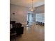Cozy living room with comfortable seating and ample natural light at 8718 Lindenhurst Pl, Tampa, FL 33634