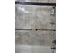 This remodeled shower over tub offers a shower head and plenty of storage for soaps and shampoos at 8718 Lindenhurst Pl, Tampa, FL 33634