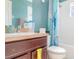 Bathroom featuring a vanity with drawers, a toilet, and a shower with curtain rod at 915 Windton Oak Dr, Ruskin, FL 33570
