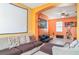 Living room offers an open concept design with tile floors and ample seating at 915 Windton Oak Dr, Ruskin, FL 33570