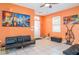Living room features tiled floors, modern decor, and a bright, cheery atmosphere at 915 Windton Oak Dr, Ruskin, FL 33570