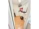 Walk-in closet featuring hardwood floors, wire shelving, and a light at 945 College Hill Dr, Clearwater, FL 33765