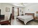 Inviting bedroom with hardwood floors and neutral color scheme at 1032 Jacob Way, Odessa, FL 33556