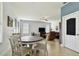 Cozy living room with neutral tones, tile flooring, and plenty of natural light at 1032 Jacob Way, Odessa, FL 33556