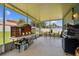 Covered patio with views of the spacious backyard at 1032 Jacob Way, Odessa, FL 33556