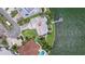 Beautiful waterfront home with a dock, lush landscaping, and a sparkling pool. Perfect for enjoying the Florida lifestyle at 11055 7Th E St, Treasure Island, FL 33706