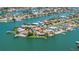 Stunning aerial view showcasing the waterfront property's ideal location and neighborhood at 11055 7Th E St, Treasure Island, FL 33706