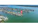 A waterfront property featuring a private dock and waterfront views, great for boaters and enjoying waterfront living at 11055 7Th E St, Treasure Island, FL 33706