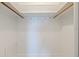 Empty walk-in closet with hooks and shelving at 11055 7Th E St, Treasure Island, FL 33706