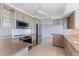 Modern kitchen with stainless steel appliances, custom cabinets, and a mosaic backsplash at 11055 7Th E St, Treasure Island, FL 33706