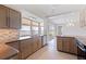 An updated kitchen with stainless appliances and views of the water from the windows above the sink at 11055 7Th E St, Treasure Island, FL 33706