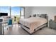Bedroom with large window and desk set up, providing ample natural light and working space at 111 N 12Th St # 1707, Tampa, FL 33602