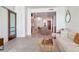 Bright open-concept living space with modern furnishings and hardwood floors flowing into kitchen with island at 111 N 12Th St # 1707, Tampa, FL 33602