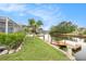 A lush backyard features a dock and a scenic canal view, perfect for relaxing and enjoying waterfront living at 15525 Old Dixie Hwy, Hudson, FL 34667