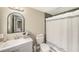 Bathroom featuring a walk-in shower and modern vanity with great lighting at 15525 Old Dixie Hwy, Hudson, FL 34667