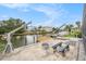 A well-equipped dock with boat lifts, work benches, and canal access, ideal for boating enthusiasts and waterfront living at 15525 Old Dixie Hwy, Hudson, FL 34667