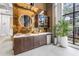 Modern bar area with stainless mini-fridge and beautiful honeycomb backsplash at 175 2Nd St S # P-2, St Petersburg, FL 33701