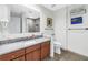 Bathroom featuring a granite countertop, sink, and walk-in shower at 175 2Nd St S # P-2, St Petersburg, FL 33701