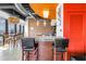 Stylish kitchen with island seating, open to dining, and views of the cityscape at 175 2Nd St S # P-2, St Petersburg, FL 33701