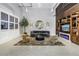 Modern living room with gray sofa, entertainment center, and stylish decor at 175 2Nd St S # P-2, St Petersburg, FL 33701