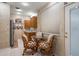 Eat-in kitchen featuring granite countertops, stainless steel appliances, and casual seating area at 1835 Alicia Way, Clearwater, FL 33764